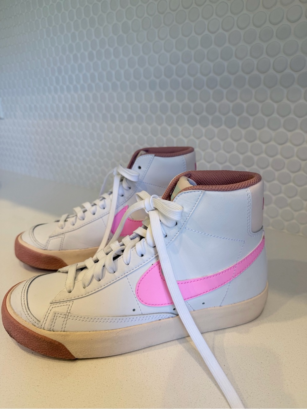 Nike Kids White High-Top Sneakers with Pink Swoosh and Mauve Accents